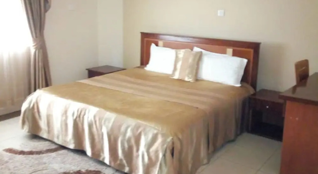Номер Executive Gardens Apartments