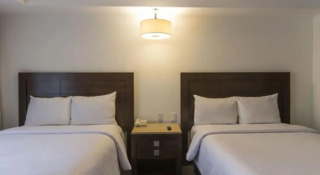 Четырёхместный номер Executive Hotel Ex-Hacienda San Xavier