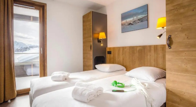 Кровать в общем номере с 2 комнатами Résidence Club MMV Les Chalets des Cimes