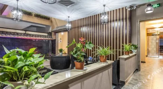 Zuimei Yinxiang Theme Hotel, Забронировать Отель Отели в центре Учжэнь, в центре