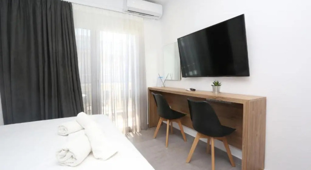 Апартаменты Downtown Seaside Suites
