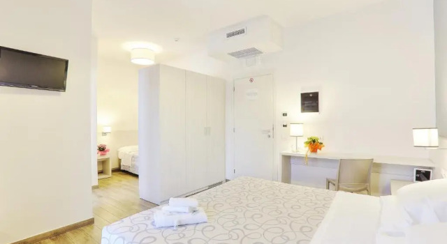 Трёхместный номер Hotel La Pineta