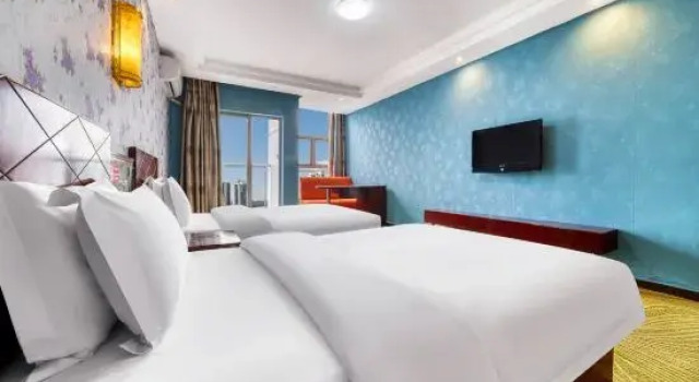 Кровать в общем номере (женский номер) Wanmao Business Hotel