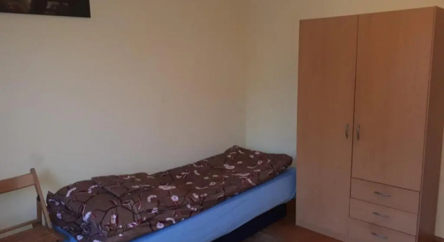Кровать в общем номере Macedonia Home