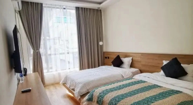 Weijianshan Guesthouse, Prenota Hotel Hotel a Yunnan con parcheggio, Parcheggio