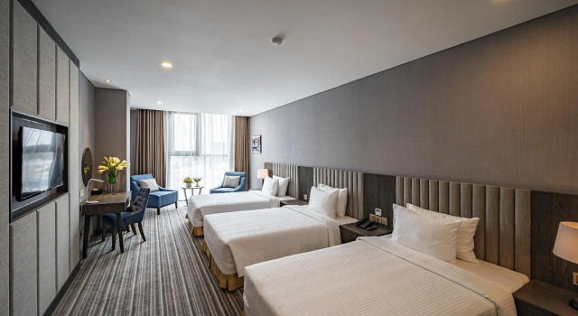Трёхместный номер Deluxe Muong Thanh Luxury Saigon Hotel