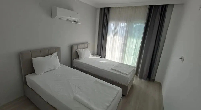 Четырёхместный люкс Comfort с балконом Aykaç Otel Susanoğlu