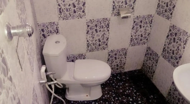 Кровать в общем номере Nethuli Guest Inn and Hostel