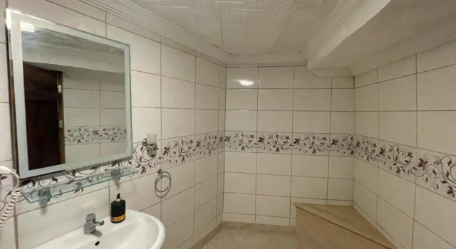 Кровать в общем номере Nomads Cave Hotel & Rooftop