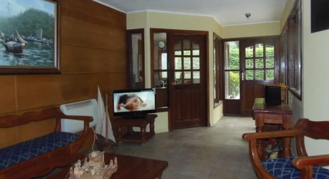 Hotel Departamentos del Sur, Забронировать Отель Пуэрто-Монт Carretera Austral