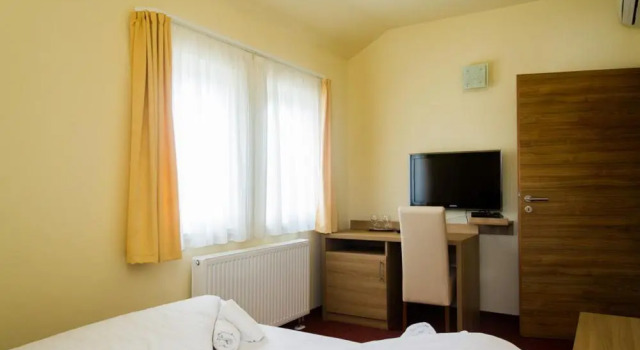Четырёхместный номер Standard Corvina Hotel-Restaurant