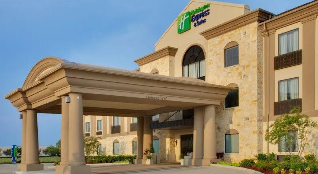Кровать в общем номере Aspen Grand Hotel Houston