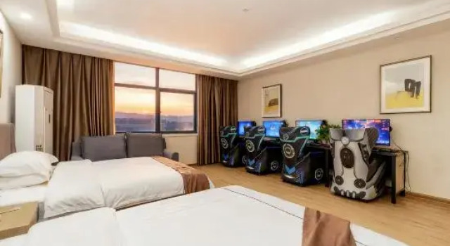 Кровать в общем номере Jishou Good Time Hotel (Jishou University)