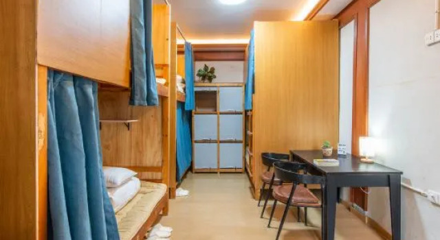Кровать в общем номере Xiangmo Youth Hostel