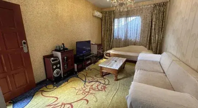 Двухместный люкс Deluxe Sanlong Hotel in Kaiyuan City