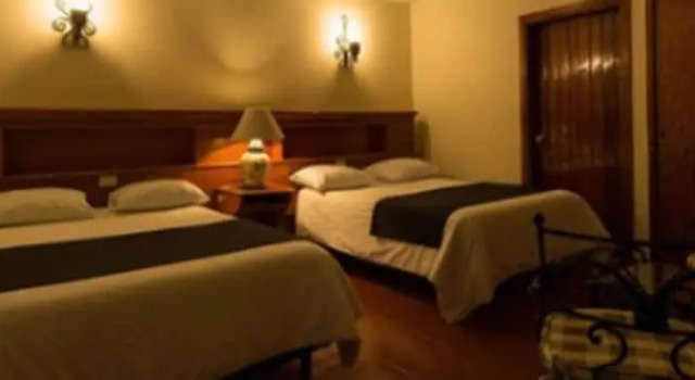 Четырёхместный номер Classic Hotel Posada Santa Bertha