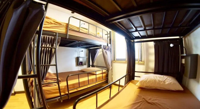 Кровать в общем номере Inn Trog And Inn Soi