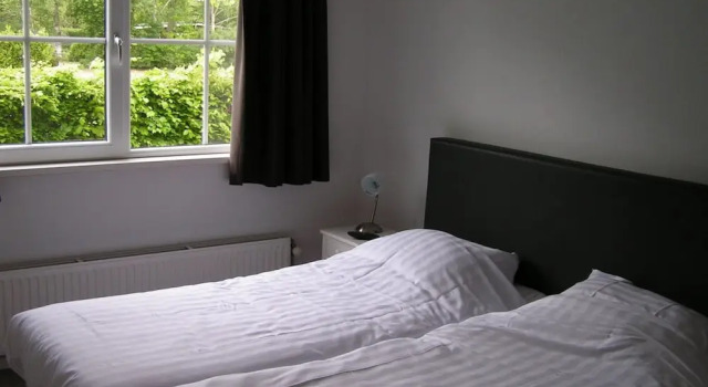 Spacious 10-person Villa in Quiet Holiday Park