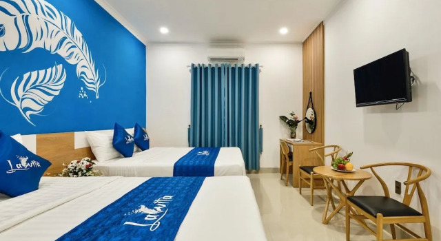 Четырёхместный номер Deluxe La Vita Hotel