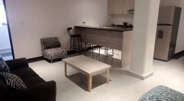 Кровать в общем номере Hotel Urban Cholula
