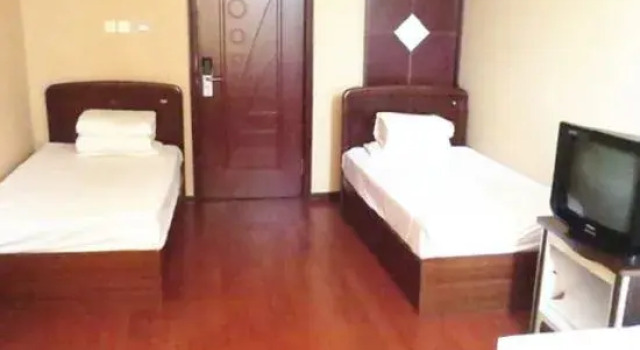 Кровать в общем номере Chagan Lake Transportation Hotel