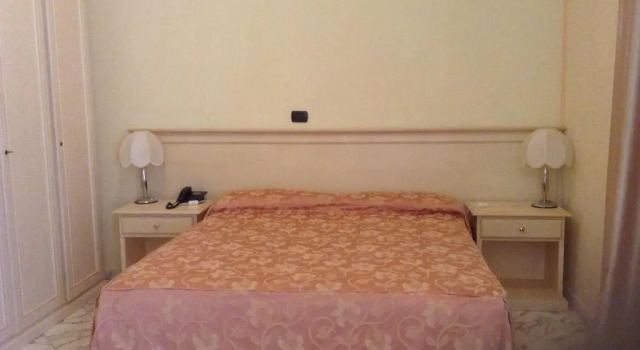 Четырёхместный номер Standard Hotel Coluccini