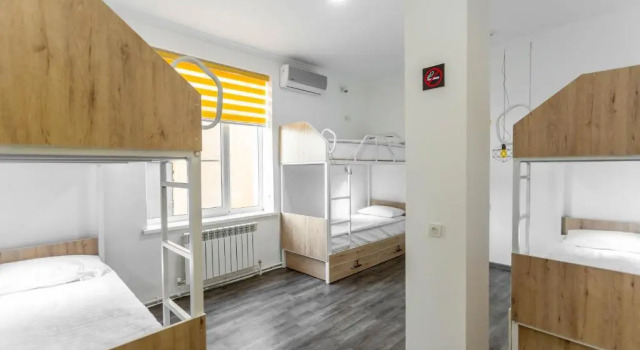 Łóżko w pokoju wieloosobowym Registan Hostel