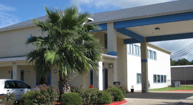 Scottish Inn and Suites, Buchen Sie Hotel Angleton Texas Gulf Coast