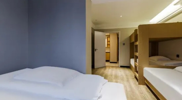 Кровать в общем номере Haoer E-sports Hotel (High-tech Wanda Science Avenue Branch)