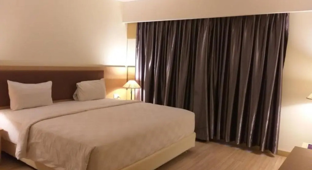 Люкс Deluxe OYO 666 D' Grande Hotel Batam