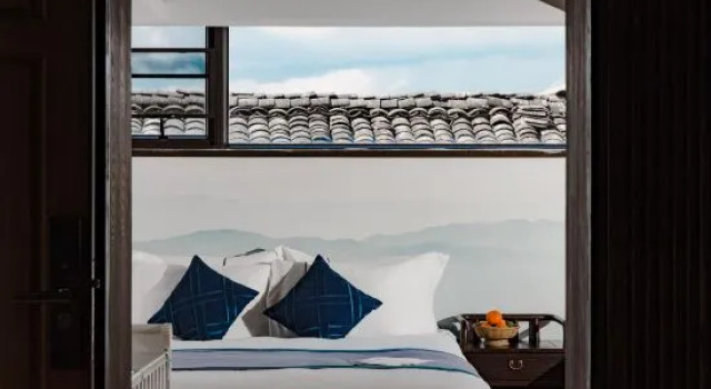Семейный люкс Mohe Shuxin Panoramic Hot Spring Homestay (Heshun Ancient Town Jiajia Dam)