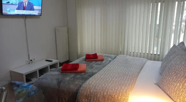 The New Studio Suite Near Akropolis, Забронировать Отель Неос-Космос Афины, рядом с Холм Филопаппос