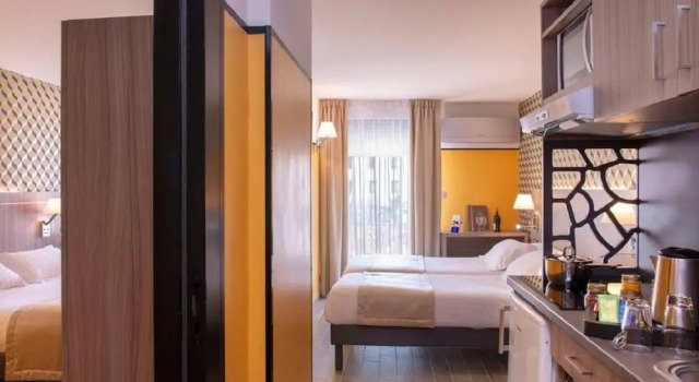 Студия Unique Hôtel Résidence & Spa