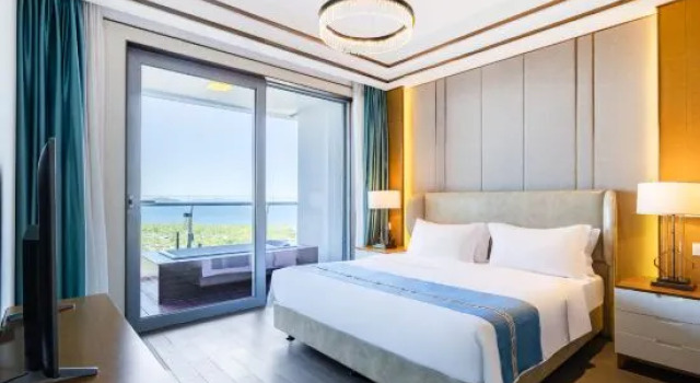 Люкс с 2 комнатами Sanya Shuishang Seaview Holiday Apartment (Haitang Bay Duty Free City)