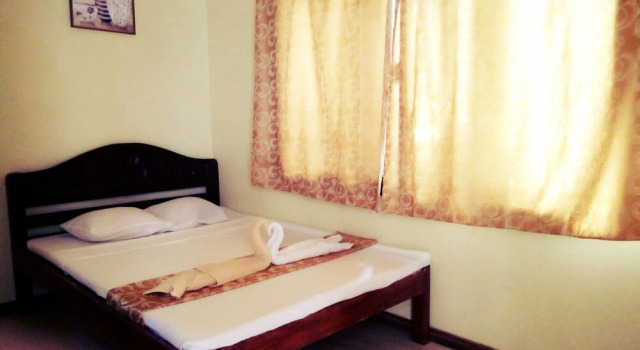 Happy Time Palawan Guest House, Prenota Affittacamere Santa Monica Palawan