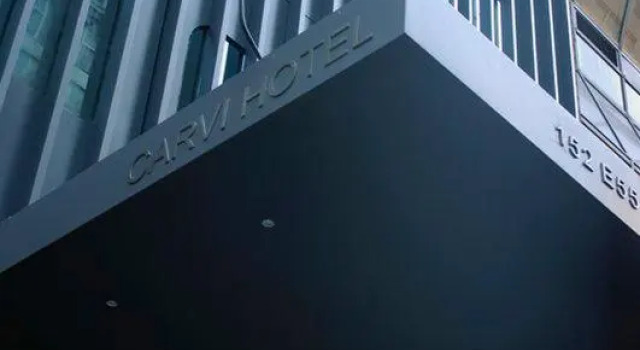 Кровать в общем номере The Historic Blue Angel Hotel Lexington Ave, an Ascend Collection