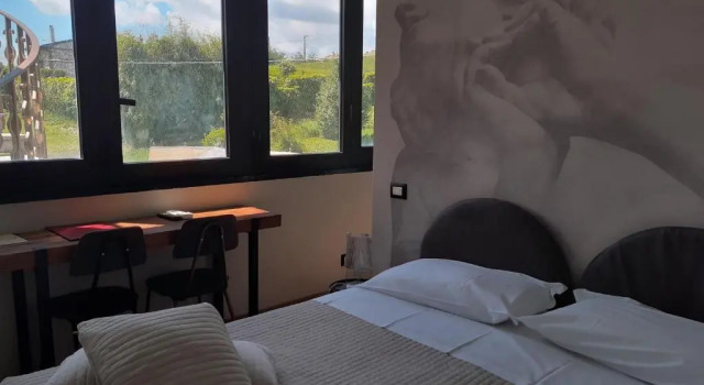 Четырёхместный номер Standard с видом на сад AgriHotel Villa Ambra