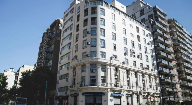 Кровать в общем номере Ker Urquiza Hotel