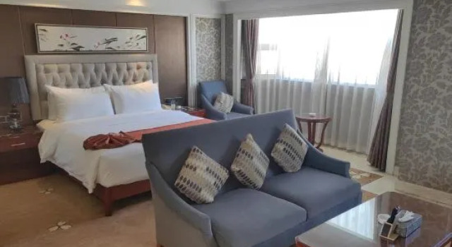 Люкс Deluxe c 1 комнатой Huaxia Hotel