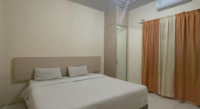 Номер Deluxe Hotel O Homestay Pakmuklis Syariah 2 Near Taman Mini Lhokseumawe