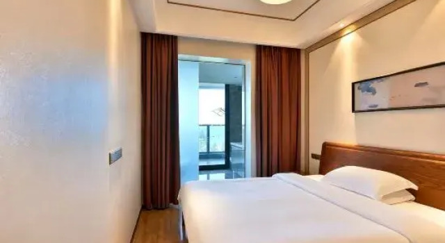 Люкс с 2 комнатами с видом на море Oceanfront Born Sea View Hotel (Boao Golden Bay Nanhai Museum Branch)