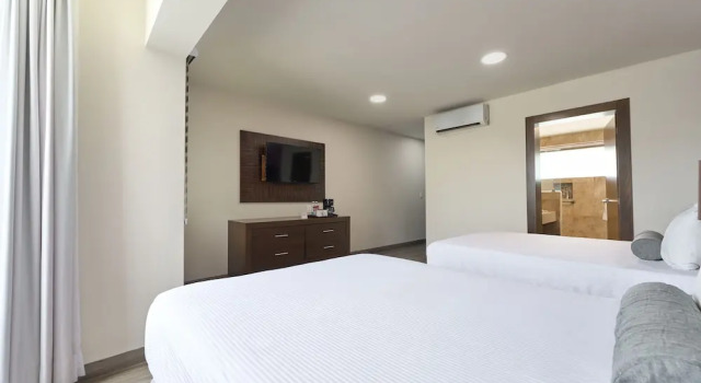 Четырёхместный номер Deluxe Hotel Estancia Business Class