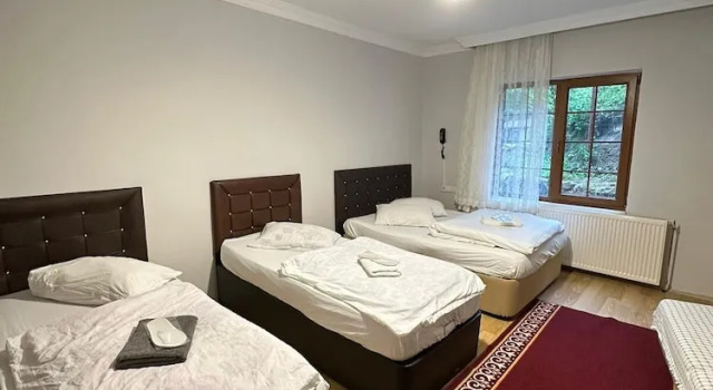 Четырёхместный номер Standard Çam Otel 2