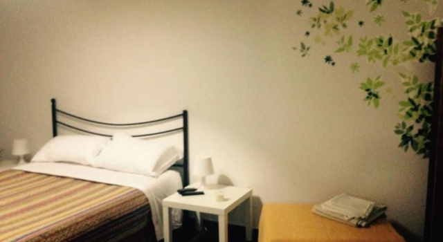 Кровать в общем номере B&B Largo Barile
