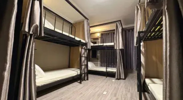 Кровать в общем номере Triple Hostel