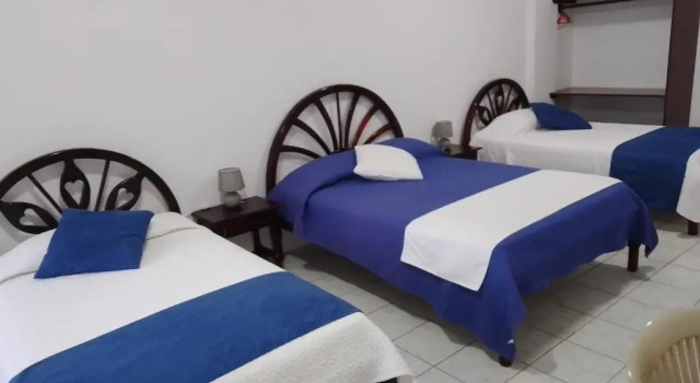 Кровать в общем номере La Isla Del Descanso