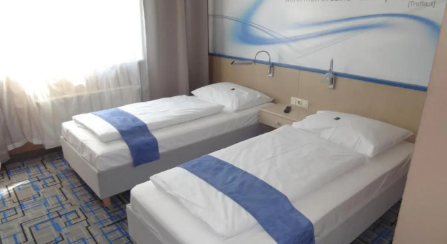 Трёхместный номер Standard PLAZA INN Mühldorf