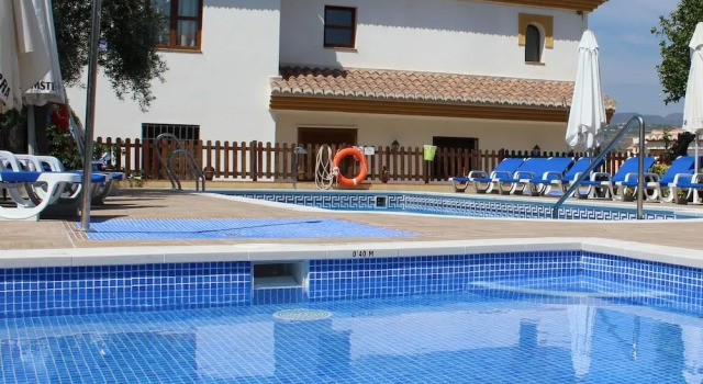 Трёхместный номер Standard с балконом и с видом на горы Hostal y Apartamento Rural Los Naranjos