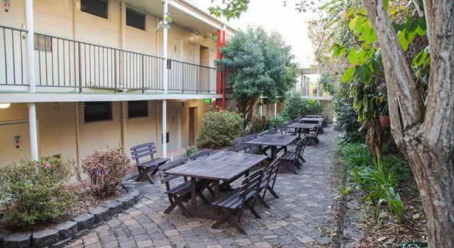 Кровать в общем номере Murwillumbah Motor Inn