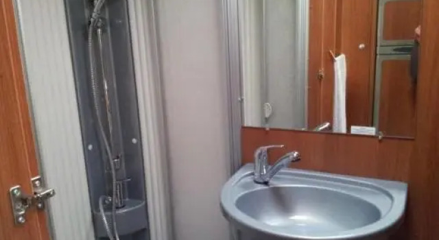 Multimedia Caravan, Book Hotel  